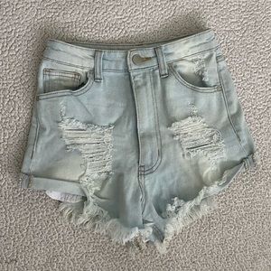 High waisted light wash ripped jeans short